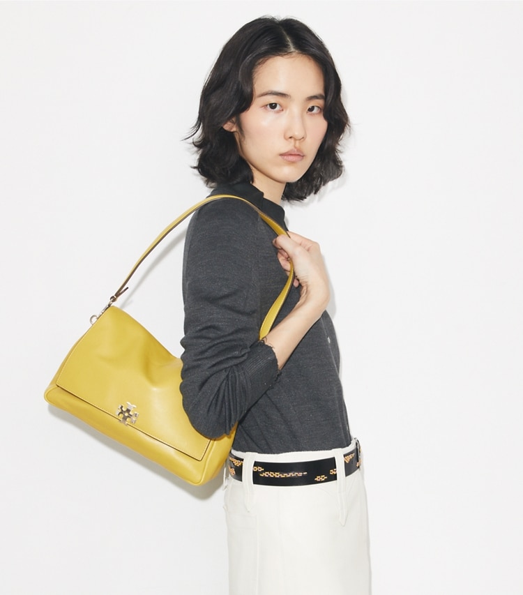 Tory Burch designer shoulder bags Charlie Shoulder Bag in Golden Kiwi accessory on model