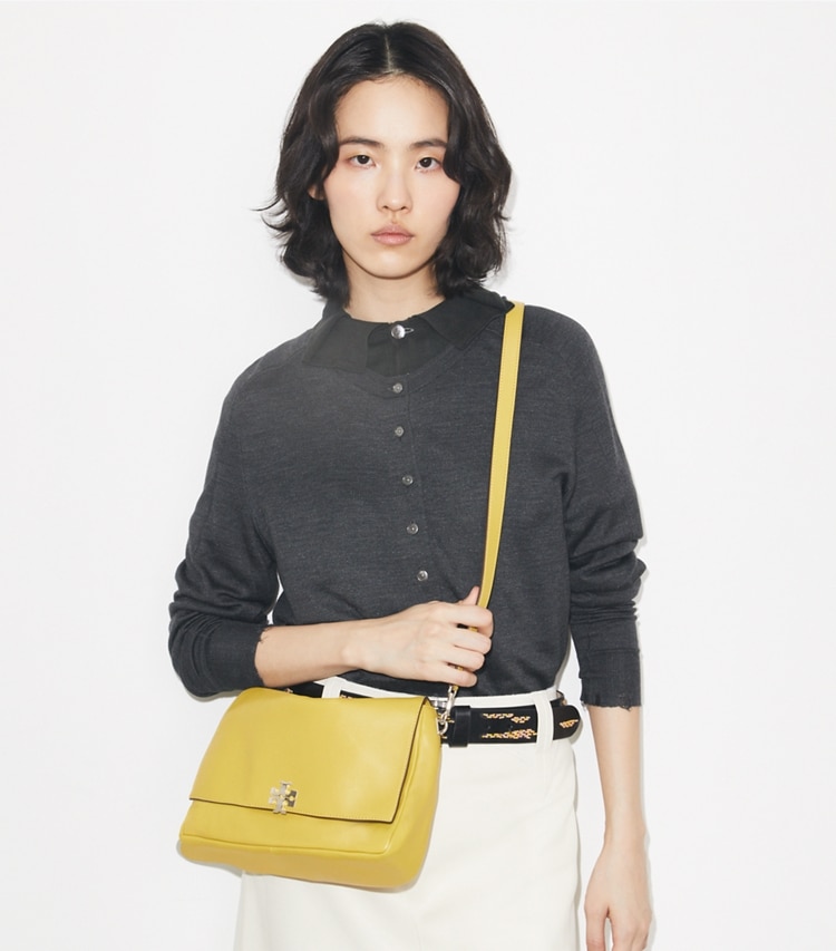 Tory Burch designer shoulder bags Charlie Shoulder Bag in Golden Kiwi additional on model