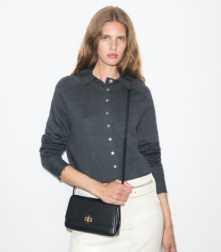 Tory Burch designer crossbody bags Charlie Wallet Crossbody in Black accessory on model
