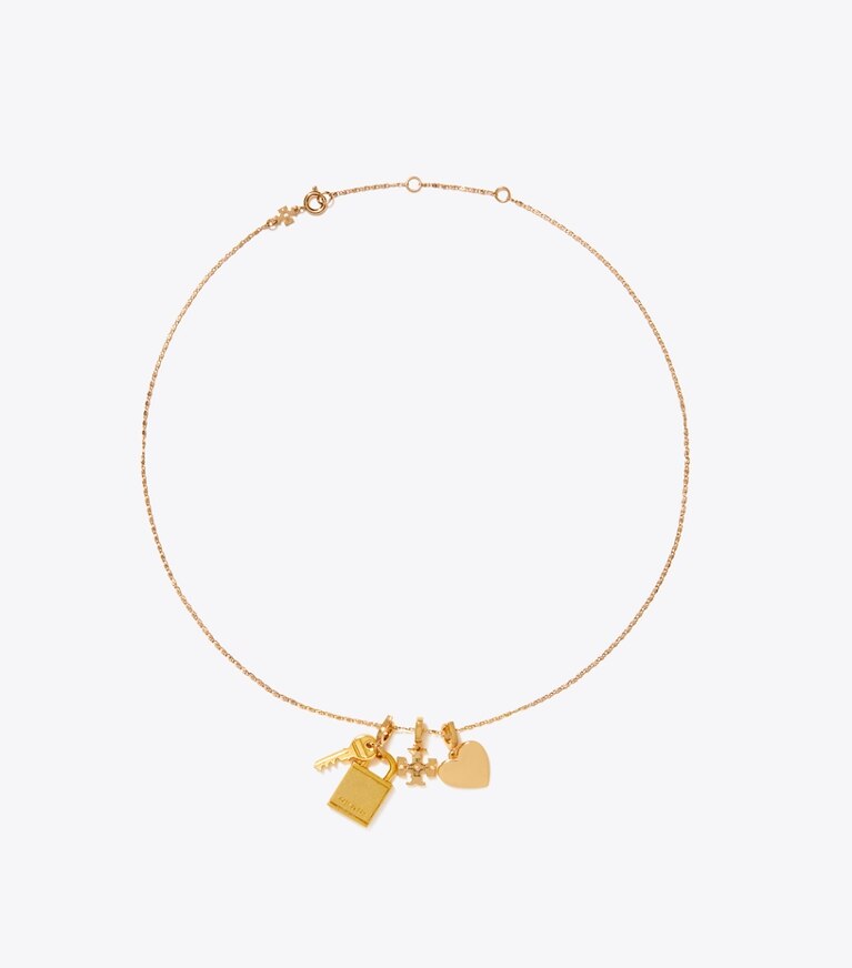 Tory Burch designer épingles à cheveux Charm cœur Curiosity in Light Brass dessus