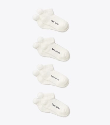 Tory Burch designer chaussettes Chaussettes de compression à pompons Performance, lot de 4 dans Snow White de face