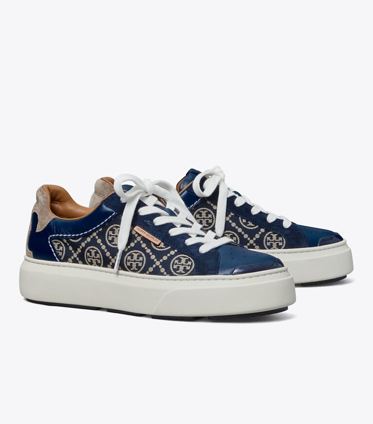Tory Burch designer baskets Chaussure de sport Ladybug à monogramme T dans PERFECT NAVY / PERFECT NAVY angle
