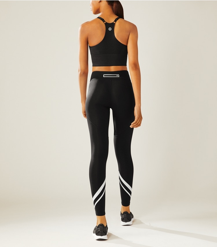 Tory Sport designer bottoms Chevron Leggings in Sport Black on model back