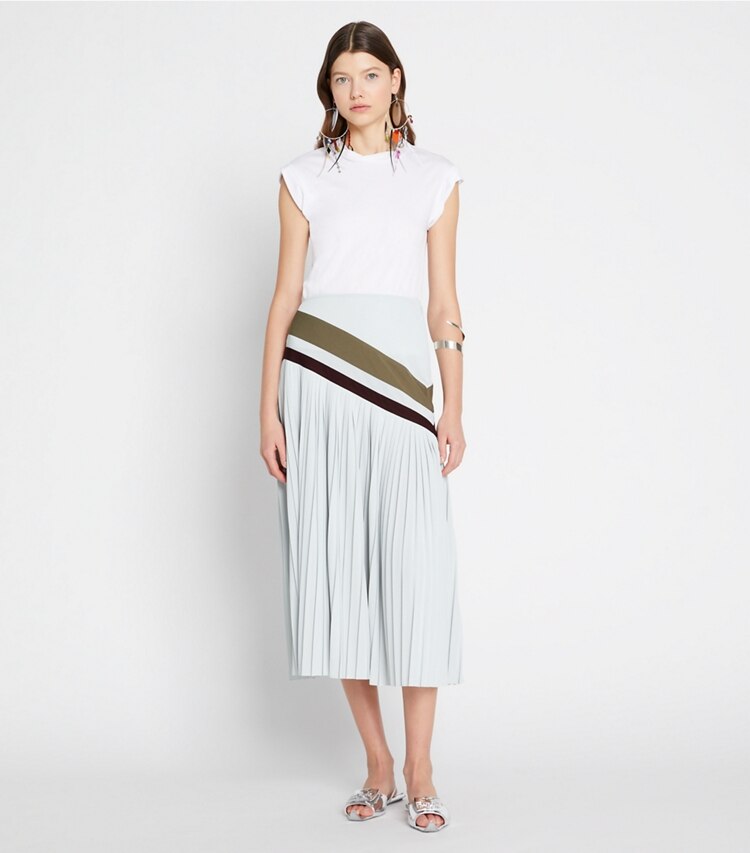 Tory Sport designer bottoms Chevron Pleated Skirt in Ballet Blue on model front