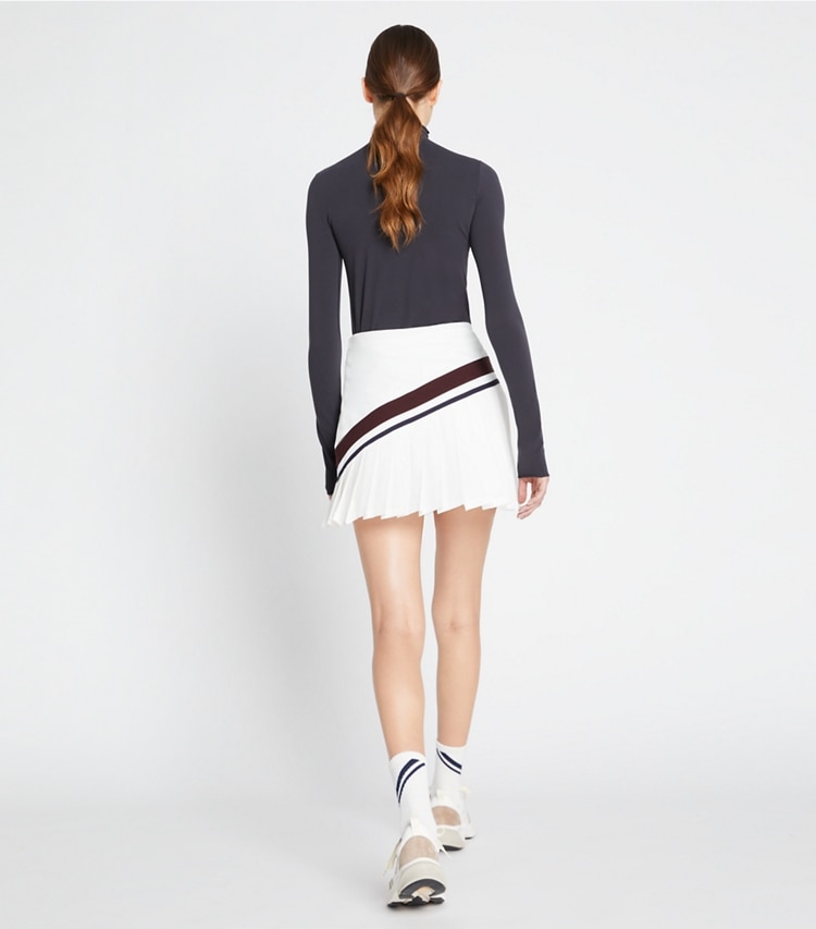 Tory Sport designer bottoms Chevron Pleated Tennis Skirt in Snow White / Winetasting on model back