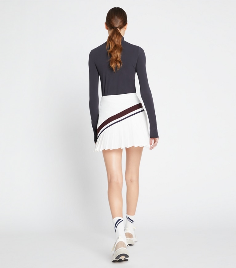 Tory Sport designer bottoms Chevron Pleated Tennis Skirt in Snow White / Winetasting front