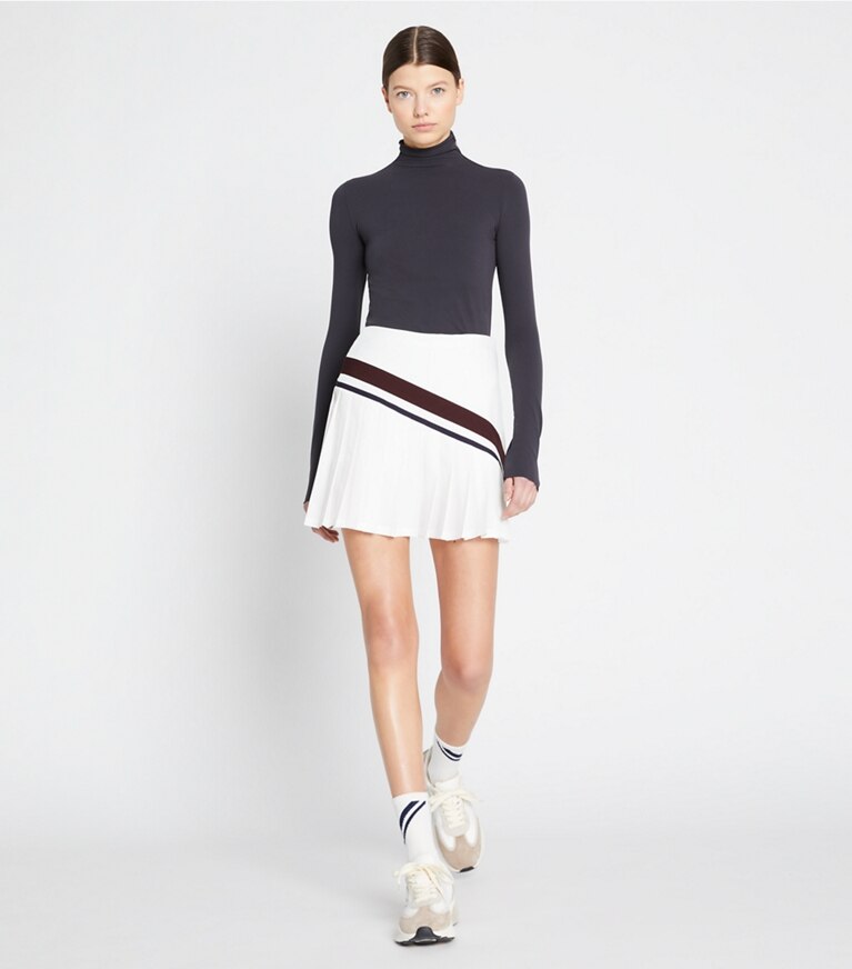 Tory Sport designer unterteile Chevron-Tennisrock mit Falten in Snow White / Winetasting front