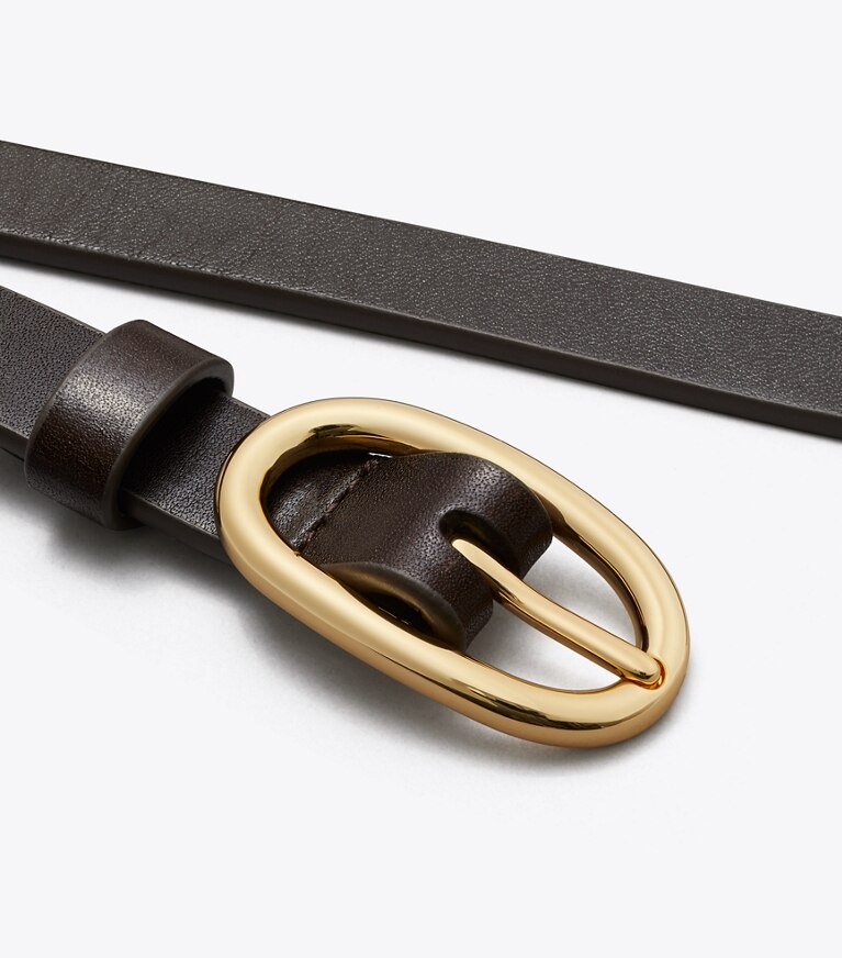 Tory Burch diseñador cinturones Cinturón mediano con hebilla Pierced en Amarena detalle