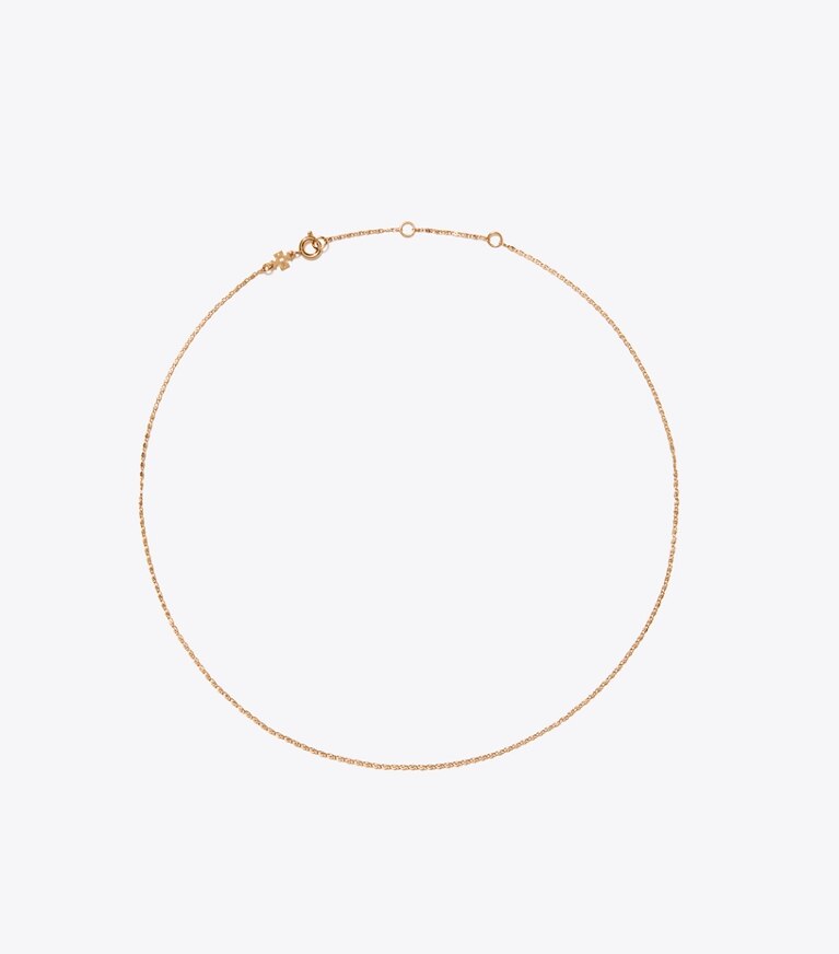 Tory Burch designer forcina Ciondolo Curiosity a cuore in Light Brass additional