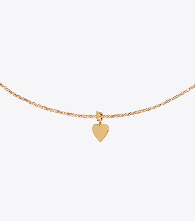 Tory Burch designer forcina Ciondolo Curiosity a cuore in Light Brass dettaglio