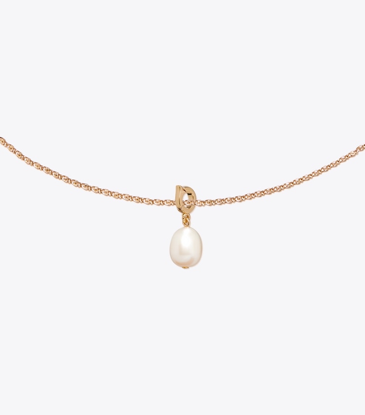 Tory Burch designer forcina Ciondolo Curiosity con perla in Tory Gold / Cream dettaglio
