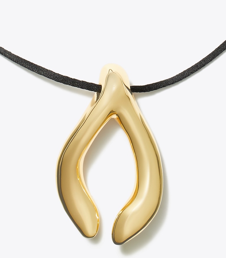 Tory Burch designer collane Ciondolo Wishbone in Light Brass / Black front
