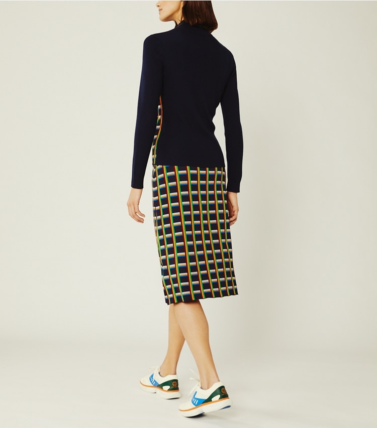 Tory Sport designer bottoms Circuit-Plaid Tech Knit Skirt in Tory Navy Circuit-Plaid on model back