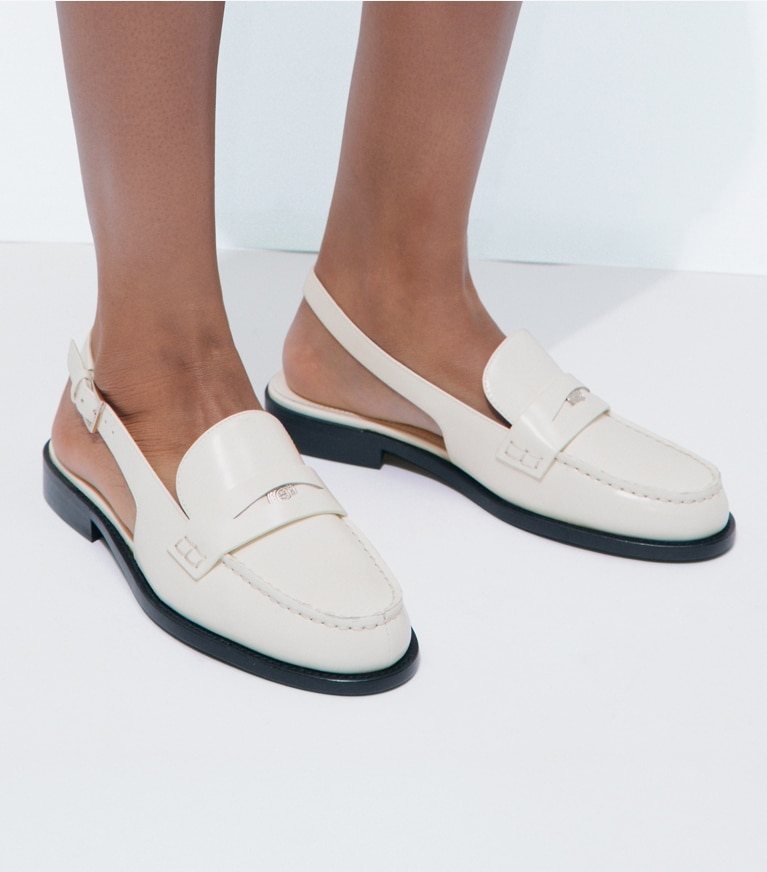 Tory Burch designer flats Classic Penny Slingback in TRESOR WHITE accessory on model