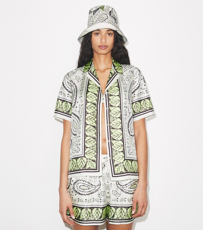 Tory Burch designer hats Cockatoo Printed Bucket Hat in Mint Cockatoo accessory on model