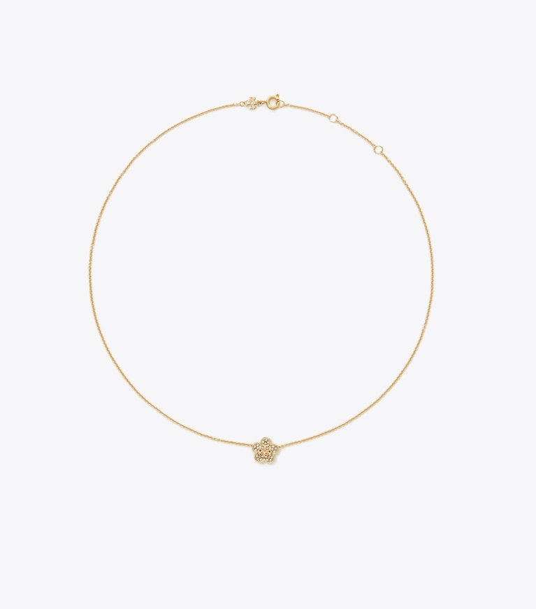 Tory Burch designer collane Collana con pendente pavé Forget Me Not in Tory Gold / Crystal front