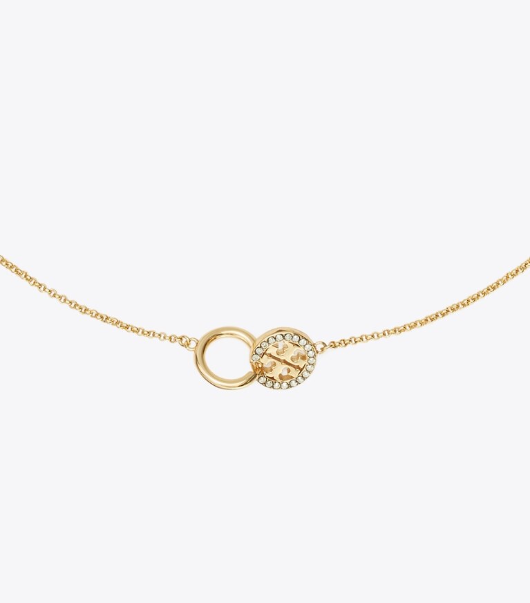 Tory Burch designer collane Collana con pendente pavé Icon intrecciata in Tory Gold / Crystal dettaglio