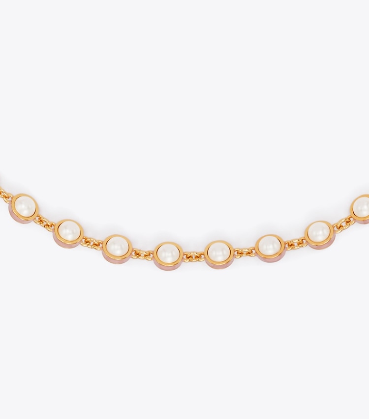 Tory Burch designer collane Collana con perla Moondance in Light Brass / Pearl / Pink dettaglio