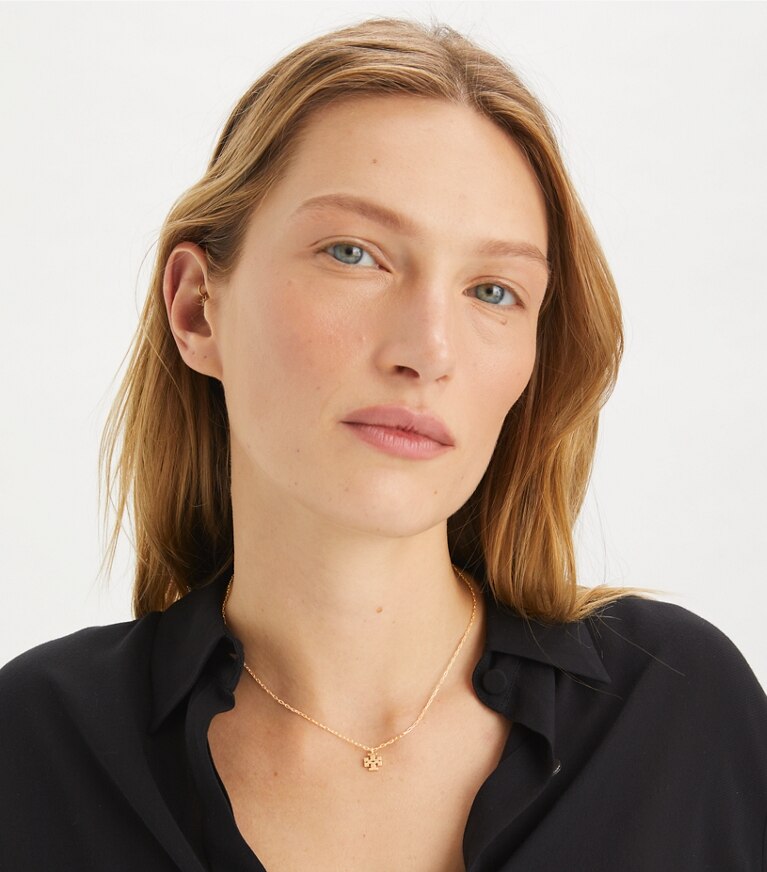 Tory Burch designer collane Collana Kira con pendente in Tory Gold front