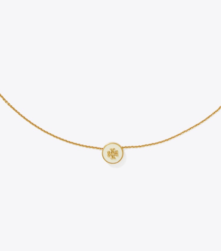 Tory Burch designer collane Collana Kira con pendente smaltato in Tory Gold / New Ivory dettaglio