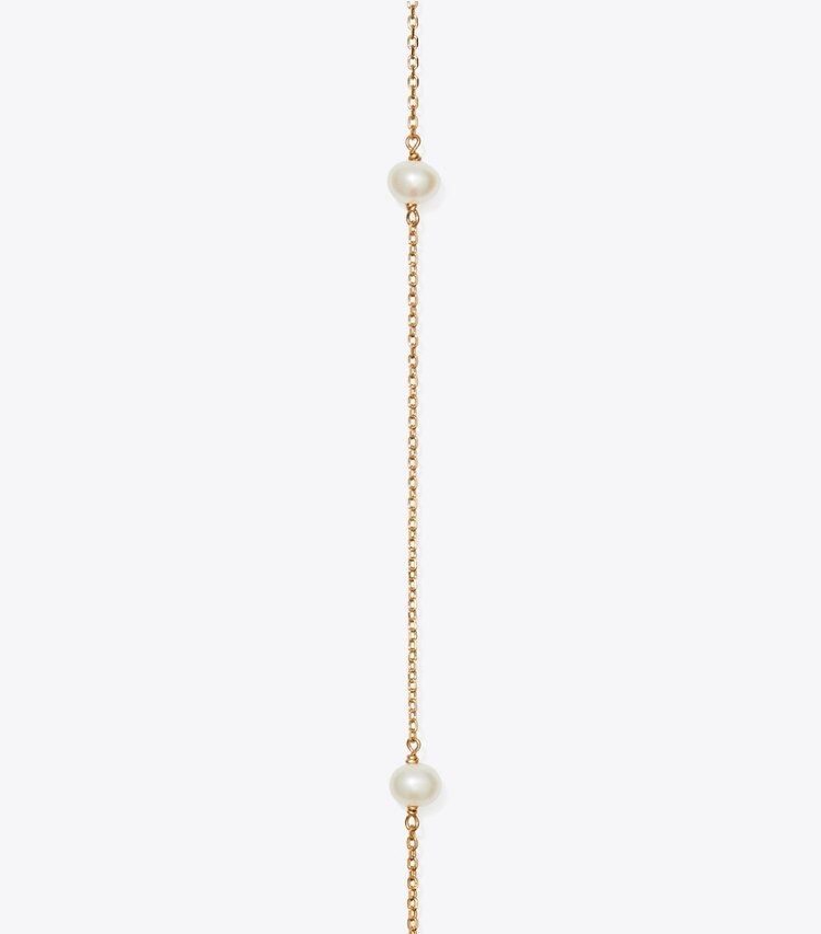 Tory Burch designer collane Collana lunga Kira Pearl in Tory Gold / Pearl dettaglio