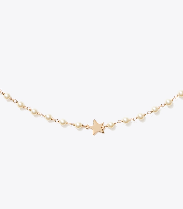 Tory Burch designer collane Collana sottile Moondance con perle e stelle in Tory Gold / Cream dettaglio