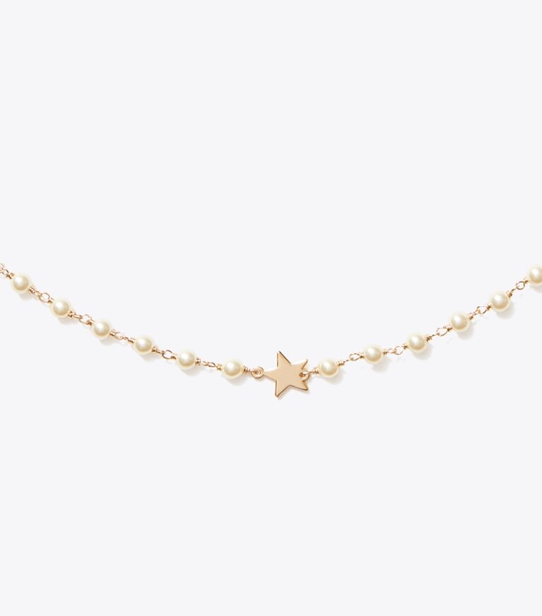 Tory Burch designer collane Collana sottile Moondance con perle e stelle in Tory Gold / Cream dettaglio