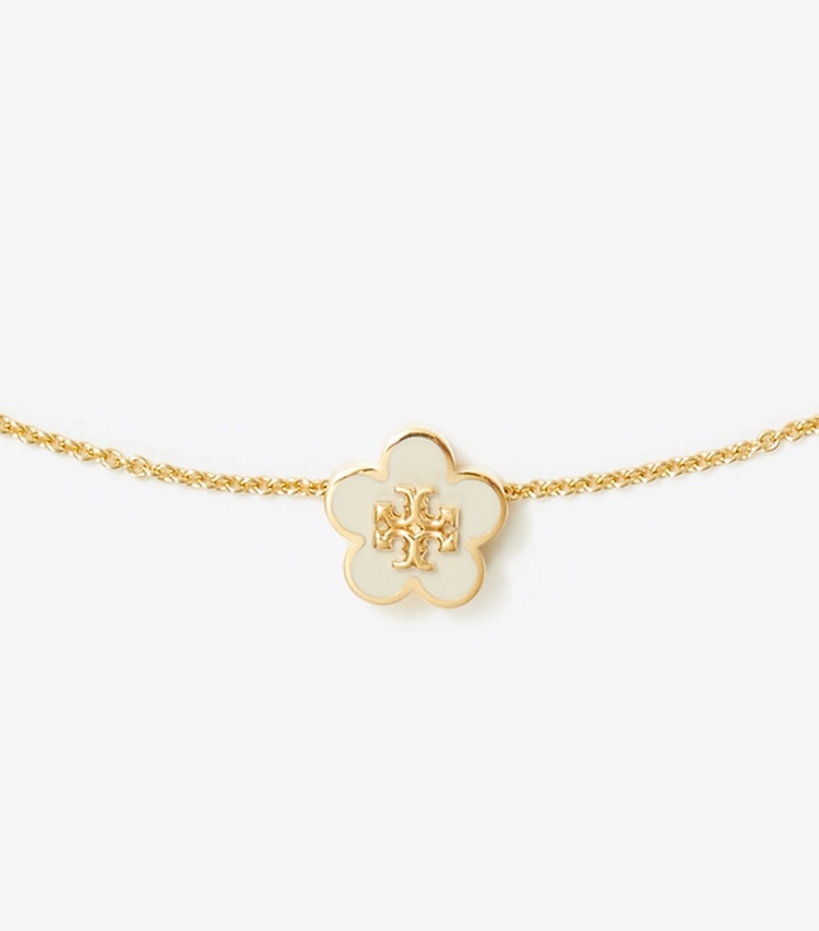 Tory Burch diseñador collares Collar con colgante «Forget Me Not» en Tory Gold / New Ivory detalle