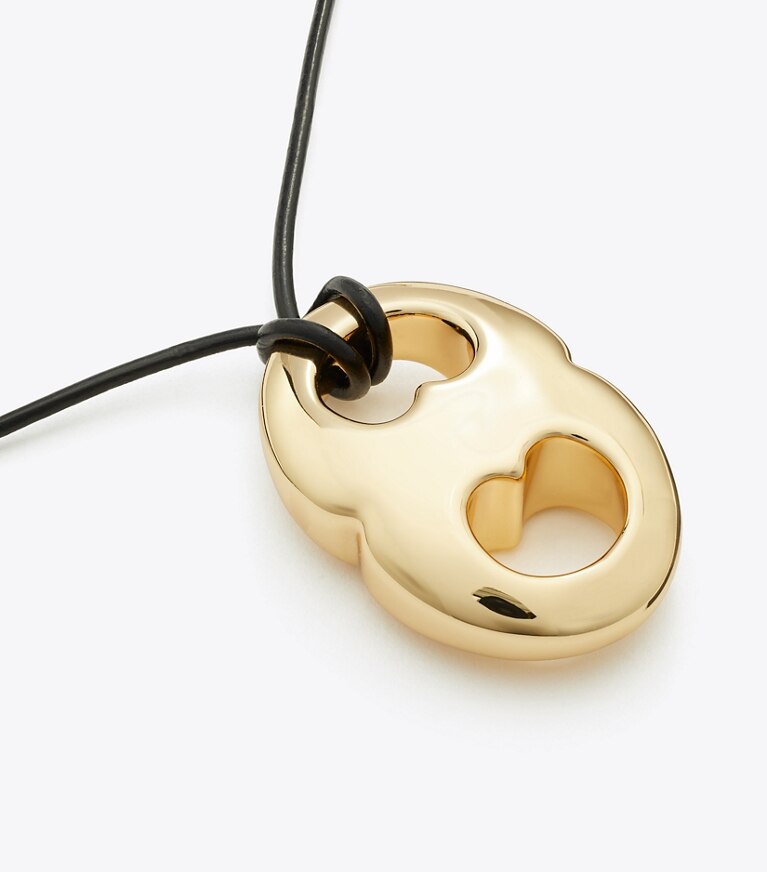 Tory Burch diseñador collares Collar con colgante Gemini en Light Brass / Black detalle