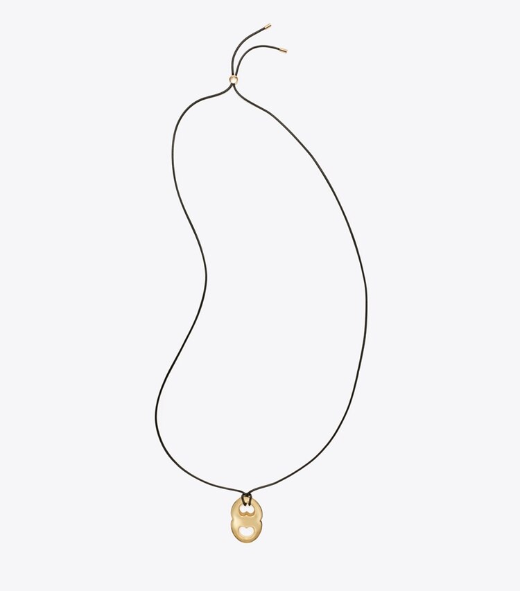 Tory Burch diseñador collares Collar con colgante Gemini en Light Brass / Black frente