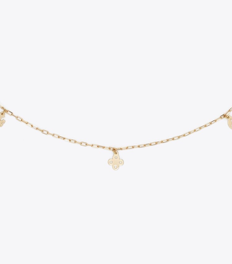 Tory Burch diseñador collares Collar con dije Forget Me Not en Tory Gold detalle
