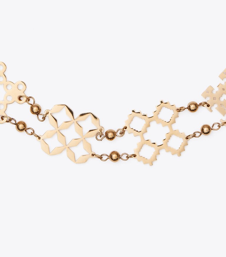 Tory Burch diseñador collares Collar gargantilla Forget Me Not en Tory Gold detalle