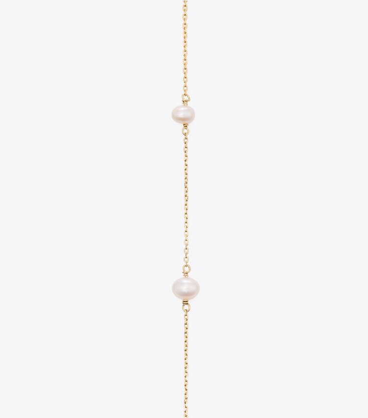 Tory Burch diseñador collares Collar largo de perlas Moondance en Tory Gold / Pearl detalle
