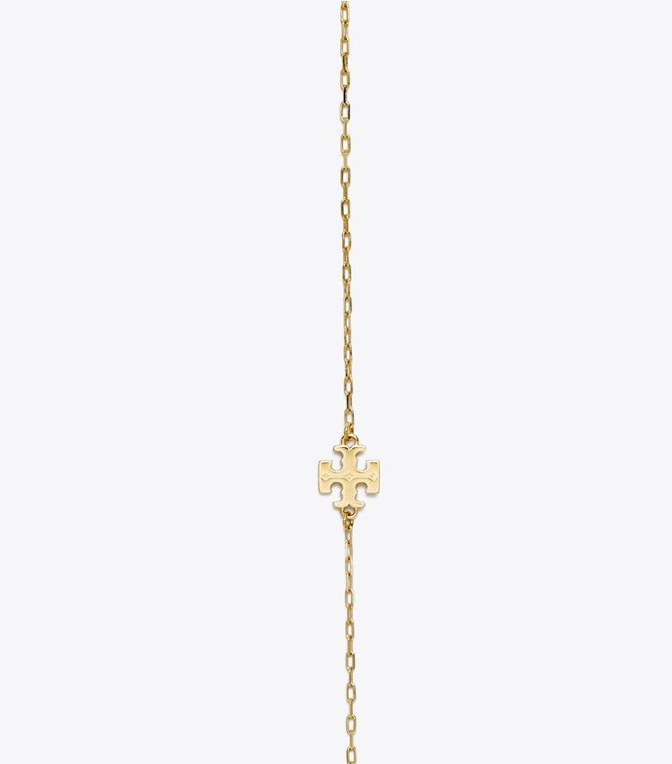 Tory Burch diseñador collares Collar largo Forget Me Not en Tory Gold detalle