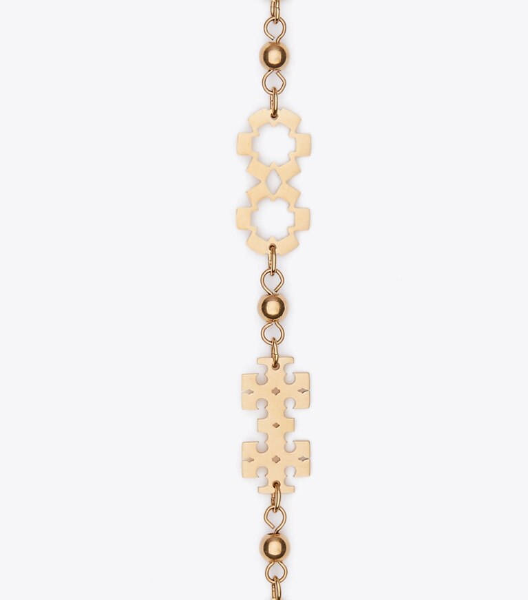 Tory Burch diseñador collares Collar largo Forget Me Not en Tory Gold detalle