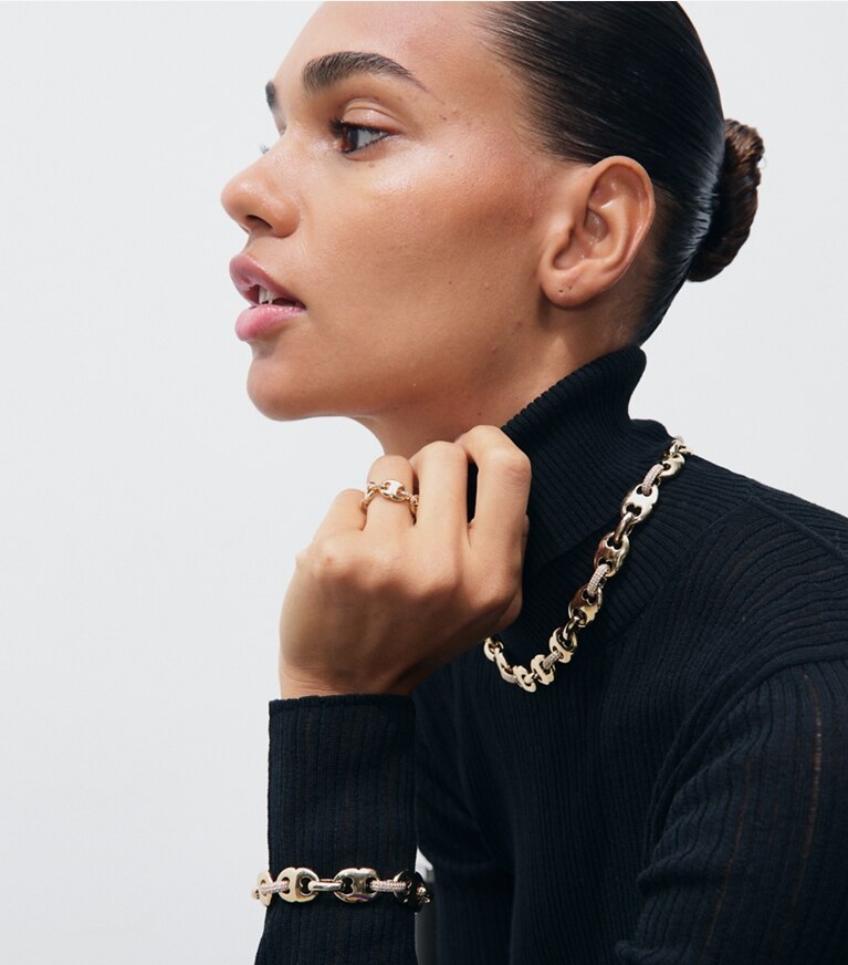 Tory Burch designer colliers Collier Gemini Link pavé dans Light Brass / Crystal accessoire sur le modèle