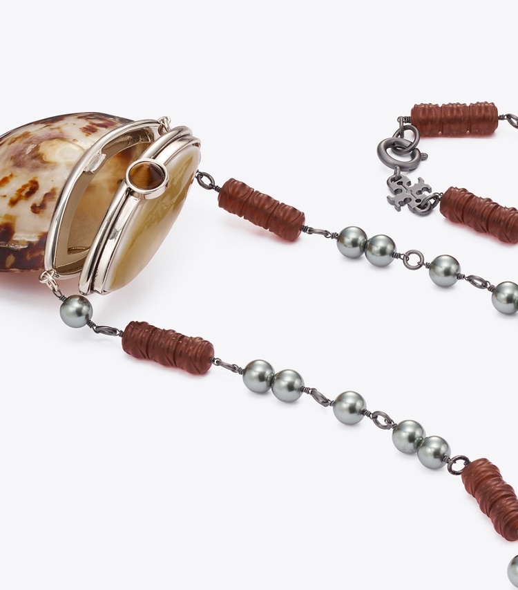 Tory Burch designer colliers Collier coquillage in Tory Silver informations