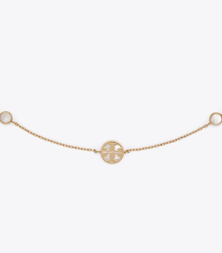 Tory Burch designer colliers Collier Icon en nacre dans Tory Gold / Mother of Pearl détails