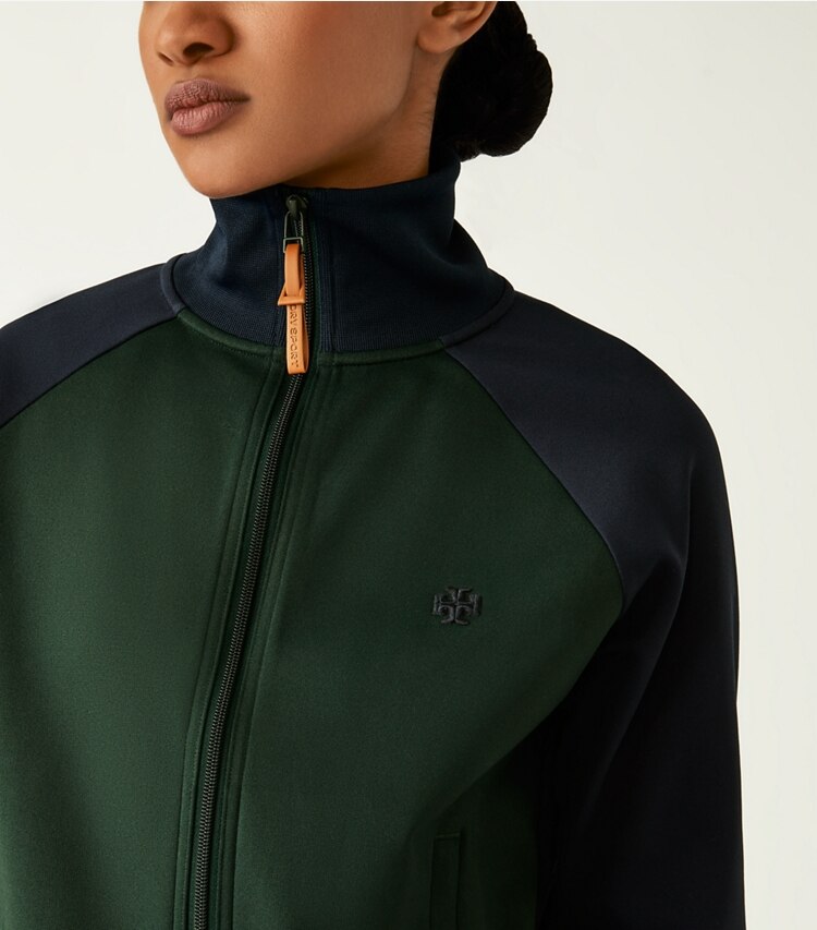 Tory Sport designer jackets Color-Block Double Knit Track Jacket in Conifer / Tory Navy on model detail