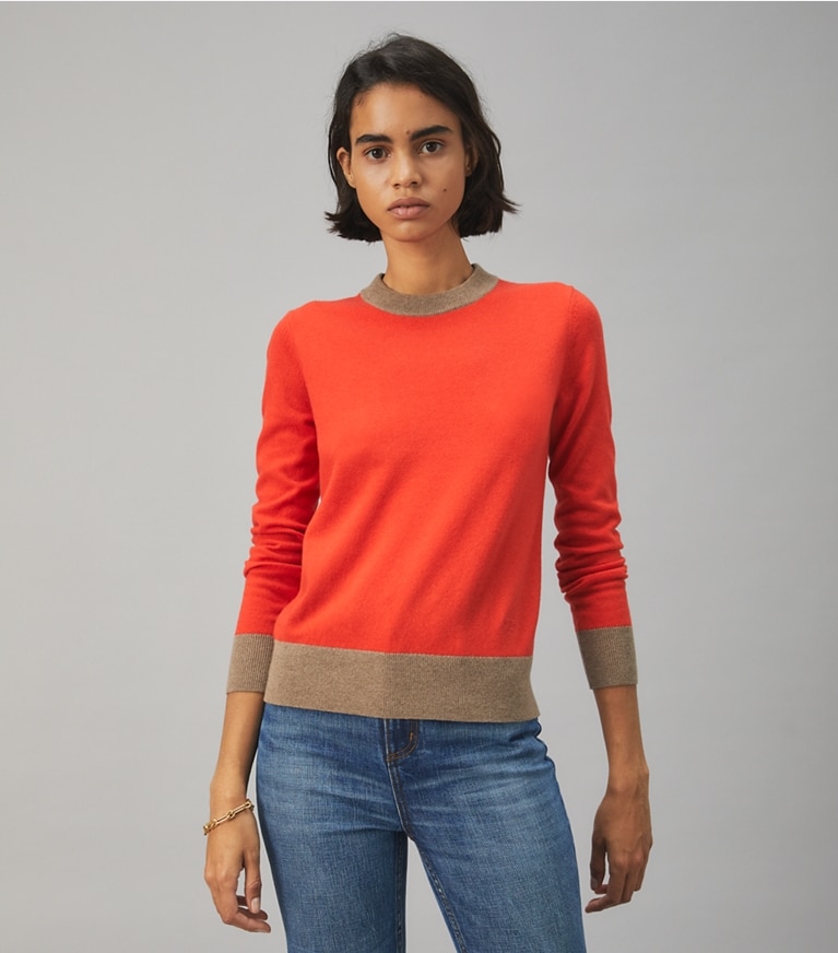 Tory Burch designer sweaters Colorblock Cashmere Pullover in BRILLIANT RED / Rich Taupe on model detail