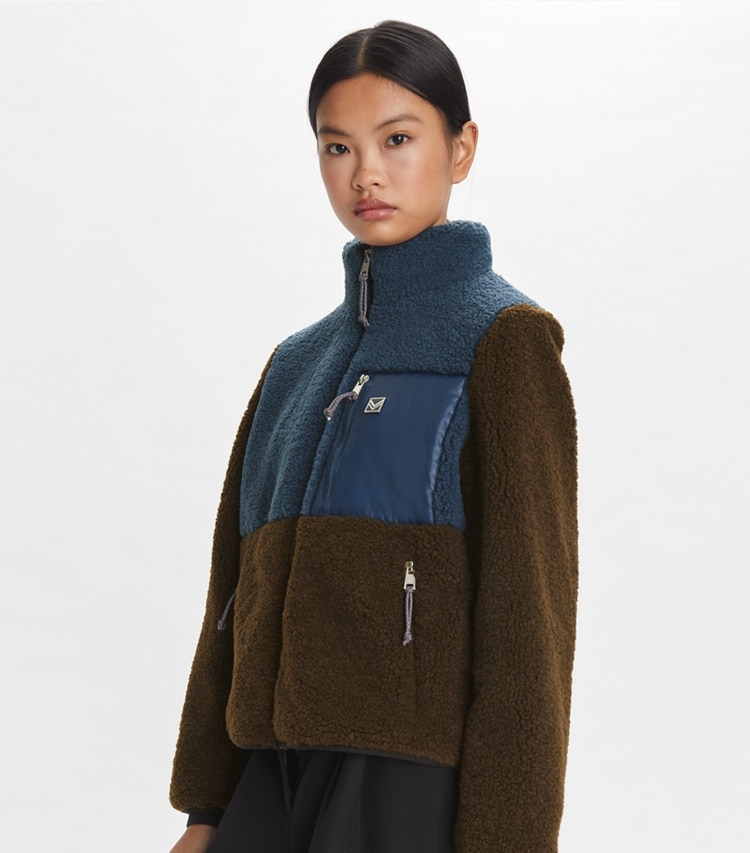 Tory Sport designer coats Colorblock Fleece Jacket in Raven / Dark Roast on model detail