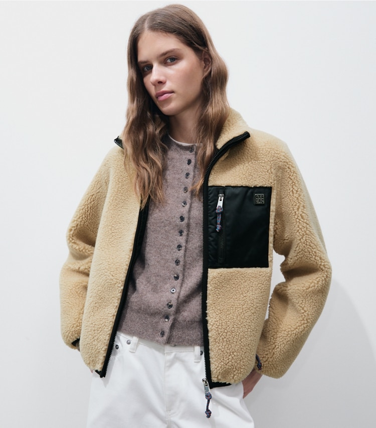 Tory Burch designer coats Colorblock Fleece Jacket in Oatmeal on model detail