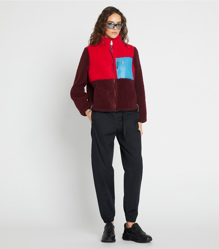 Tory Sport designer coats Colorblock Fleece Jacket in Radiant Red / DIVINE BURGANDY on model front