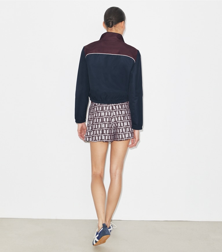 Tory Burch designer jackets Colorblock Nylon Jacket in Medium Navy / Winetasting front