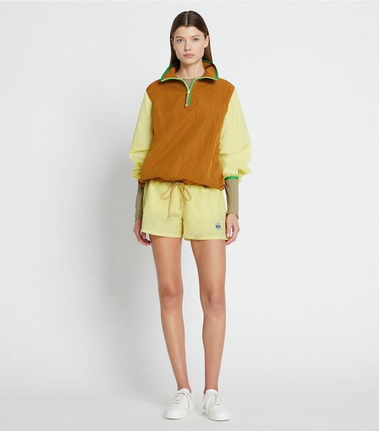 Tory Sport designer ジャケット カラーブロック ナイロン ハーフジップジャケット in Ridge / Yellow Dahlia front