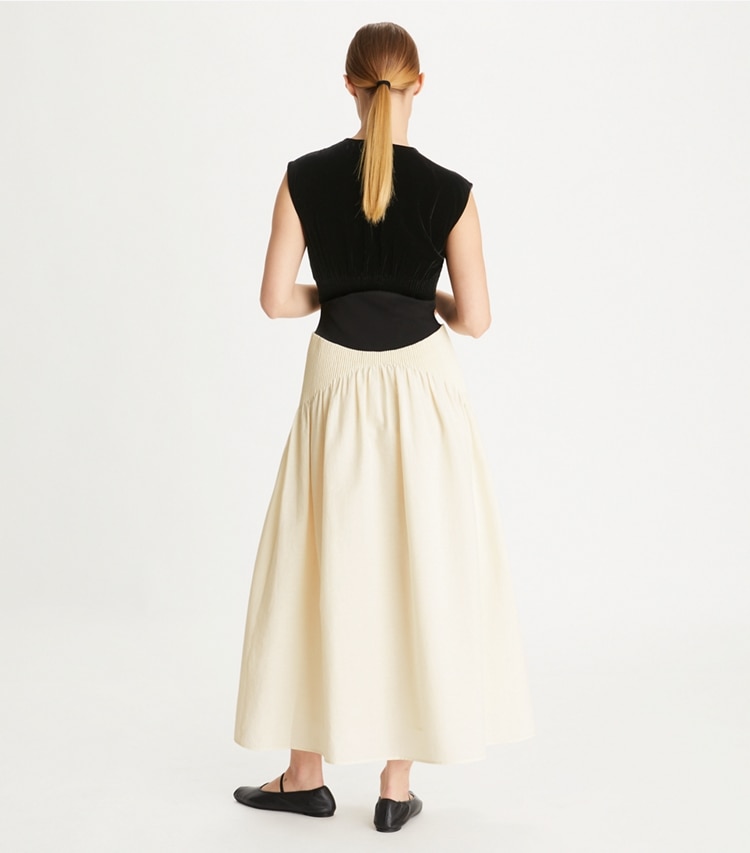 Tory Burch designer dresses Colorblock Pleated Dress in Biscuit on model back