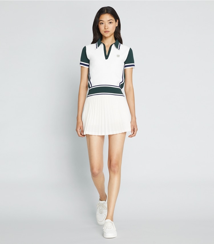 Tory Sport designer sweaters Colorblock Sweater in Snow White / Conifer on model front