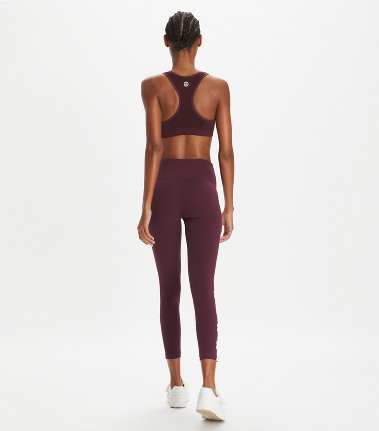Tory Burch designer bottoms Compression Logo 7/8 Legging in Winetasting front
