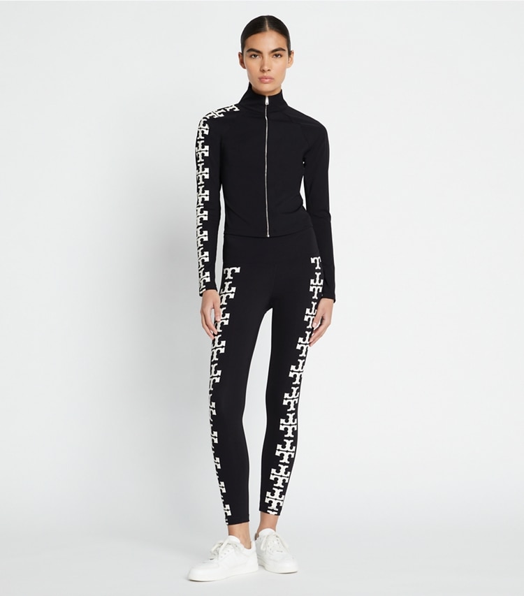 Tory Burch designer bottoms Compression Logo 7/8 Legging in Black T Logo Row on model front