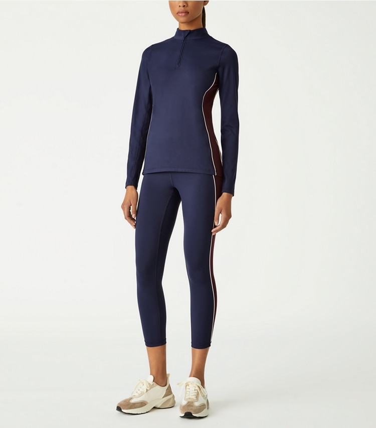 Tory Sport designer tops Contrast Piped Half-Zip Pullover in Tory Navy / Winetasting on model front